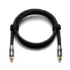 Opgerolde optische kabel met twee klittenbandjes en twee Toslink-connectoren.